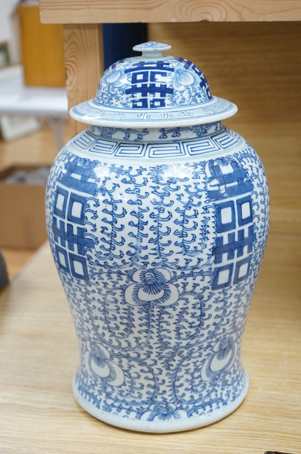 A Chinese blue and white ‘shuangxi’ jar and cover, 19th / 20th century, 43cm high